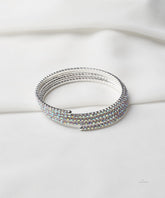 Silver Coil Bangle With Aurora Rhinestones